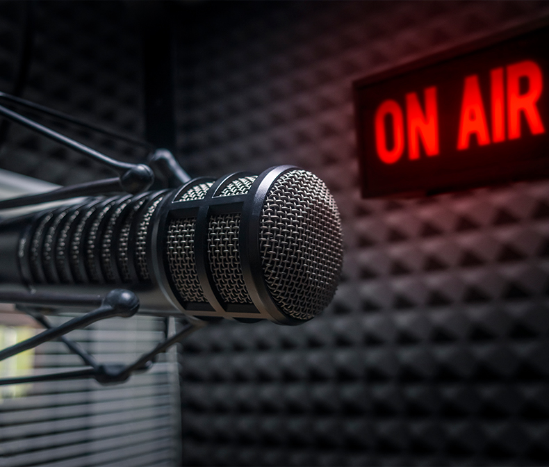 Microphone and red ‘ON AIR’ sign