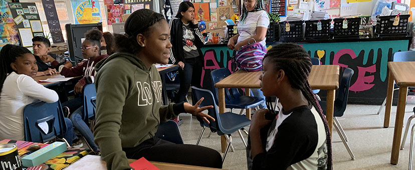 Teenage girls in classroom setting Teenage girls in classroom setting