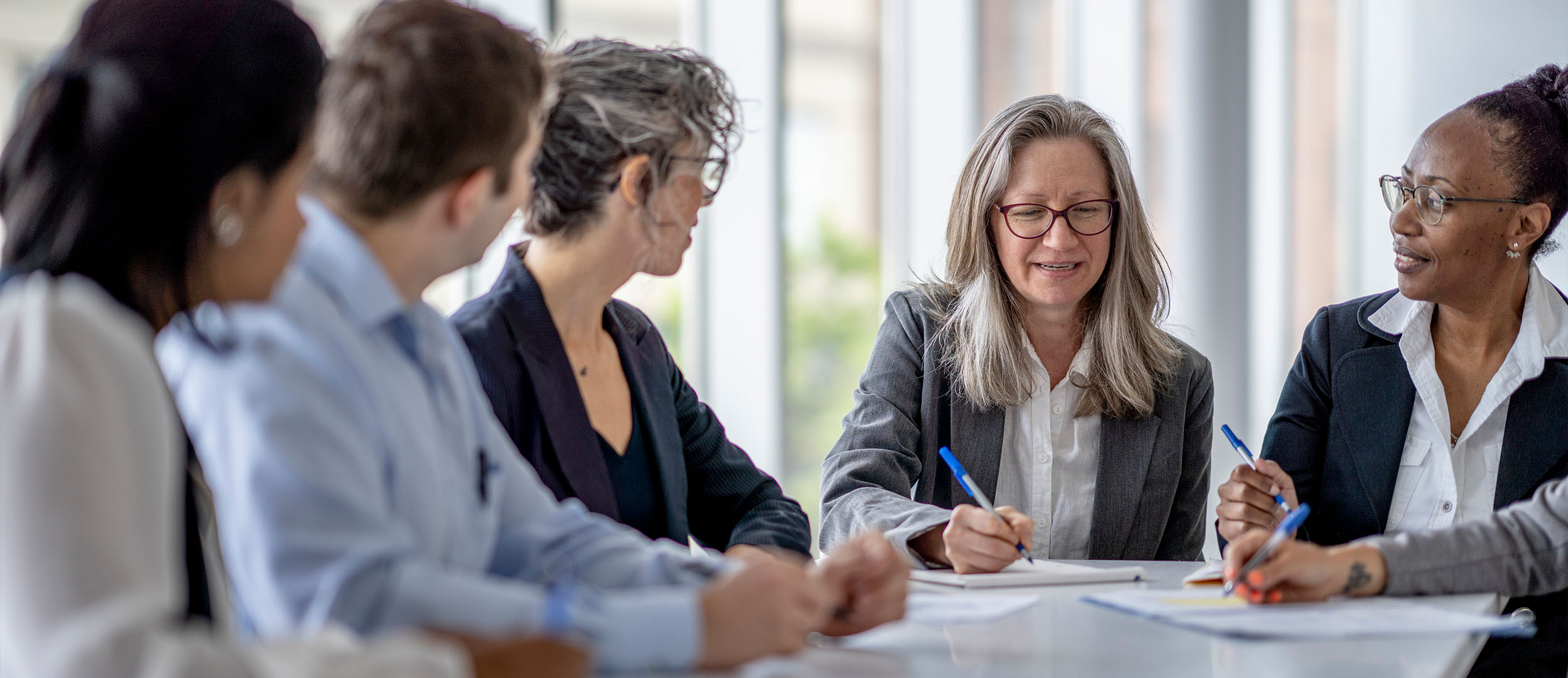 Group of people in a meeting Group of people in a meeting